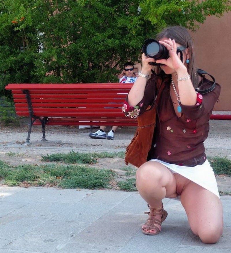 Девушка фотограф засветила