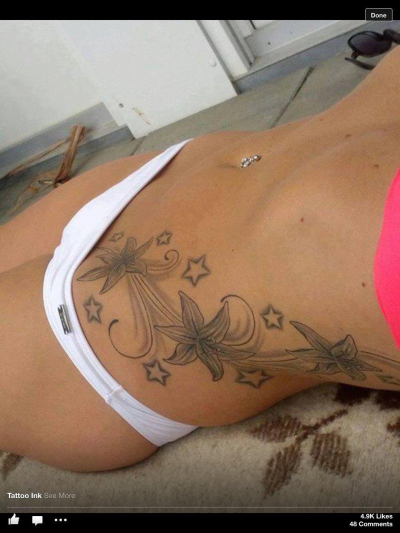 Женские татуировки на животе