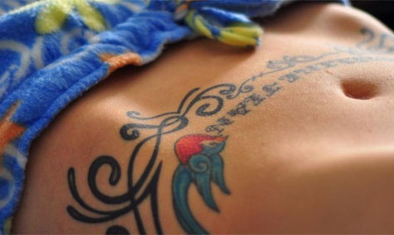 Тату женские на животе