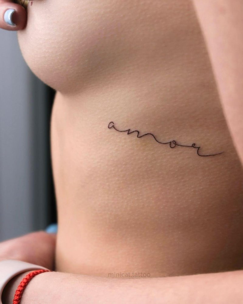 Тату на ребрах для девушек надписи