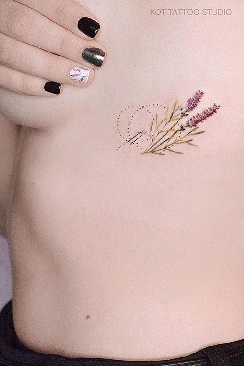 Тату веточка под грудью