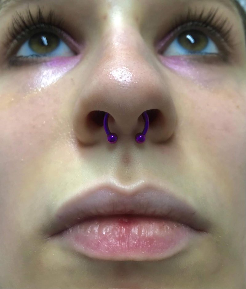 Пирсинг перегородки носа