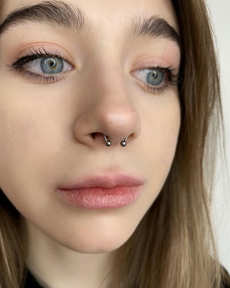 Прокол носа септум