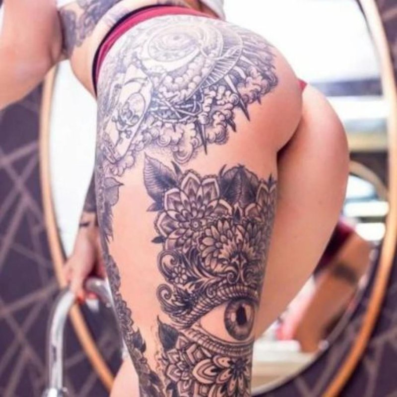 Тату на бедре женские