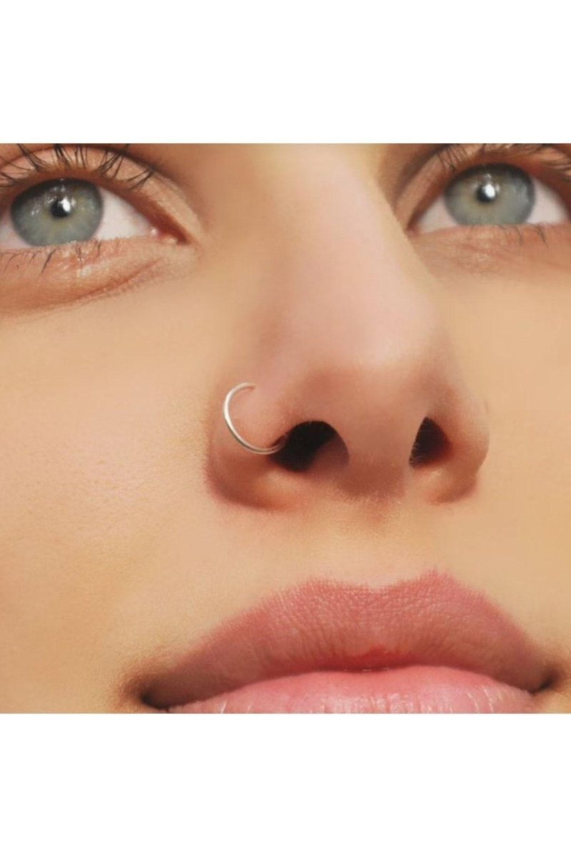 Пирсинг нострил кольцо