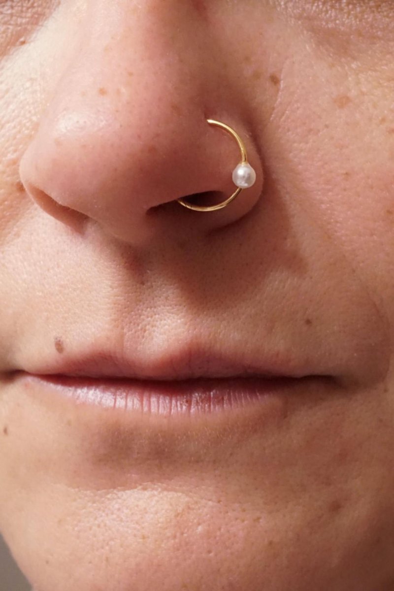 Пирсинг в нос кольцо