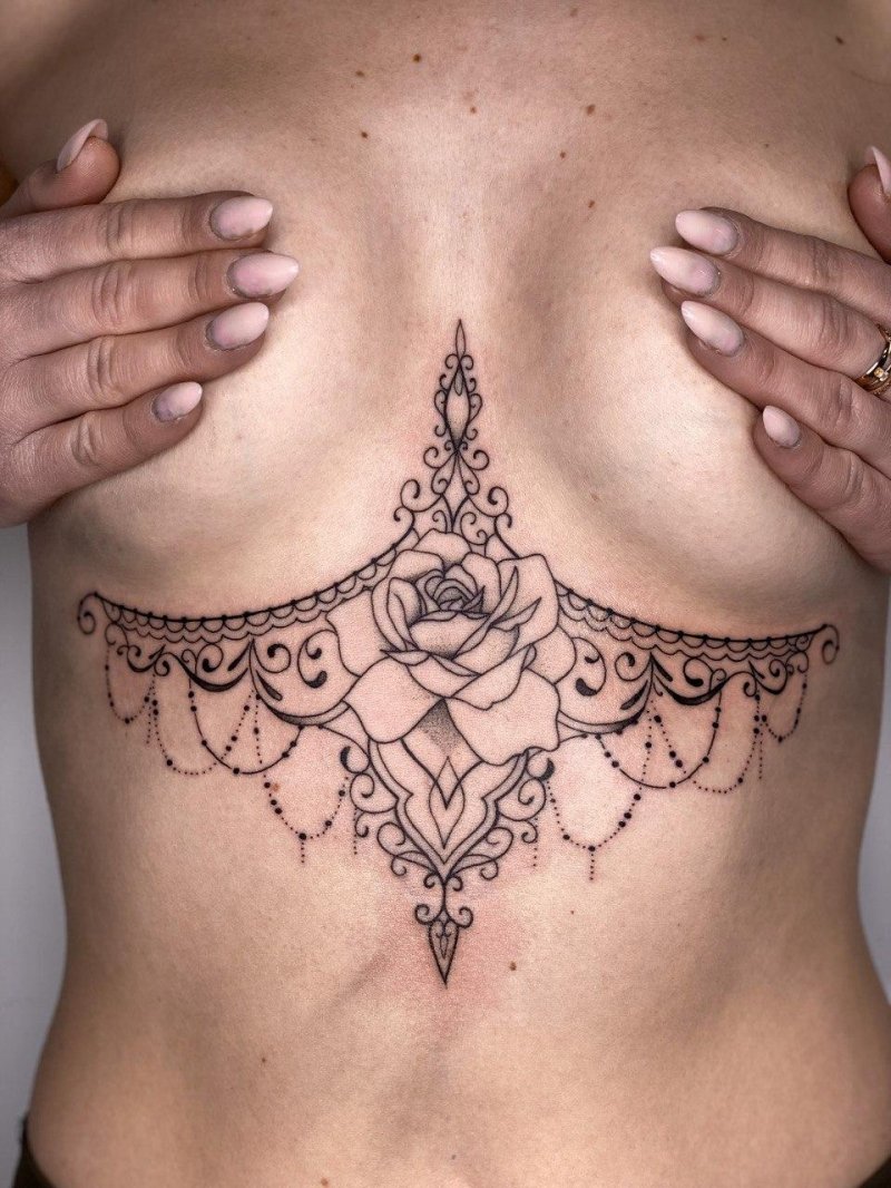 Тату под грудью женские